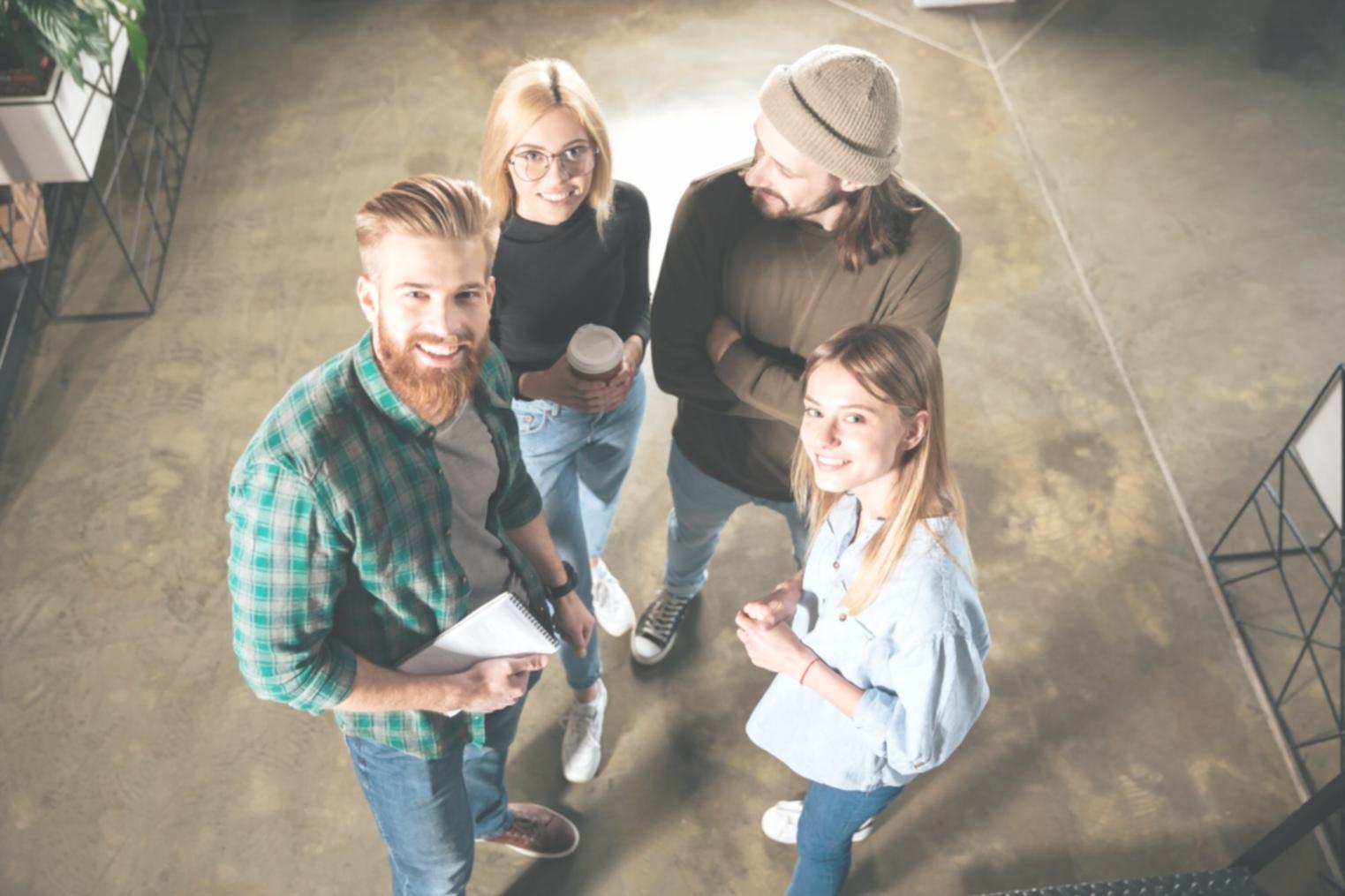 Students collaborating on financial planning exercises in modern learning environment